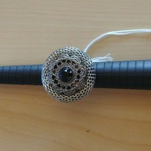 Silver and black ring